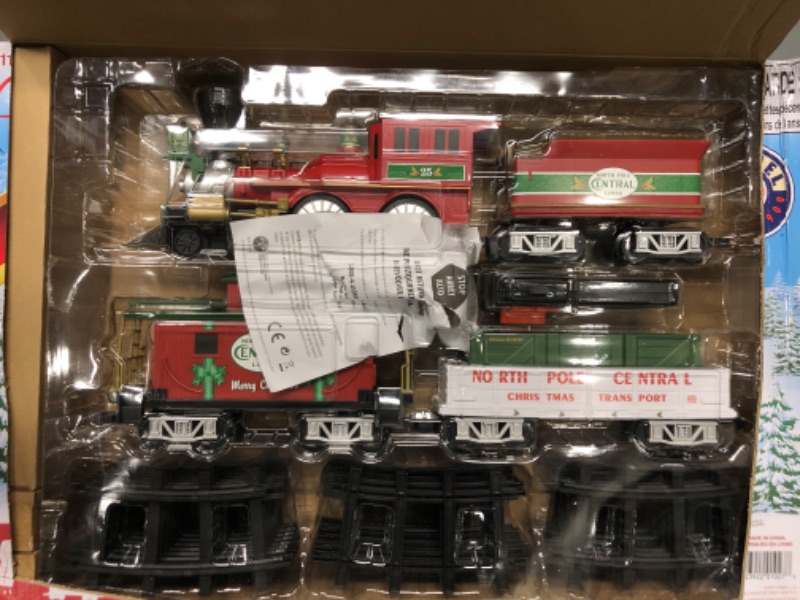 Photo 2 of Lionel North Pole Central Ready-to-Play Freight Set, Battery-powered Model Train Set with Remote Multi, 50 x 73"
