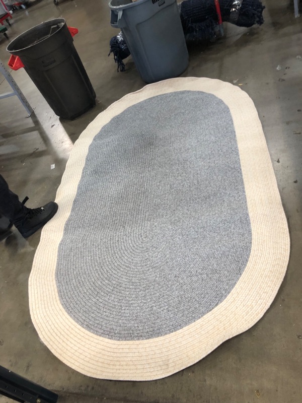 Photo 1 of 4'10"x8" oval rug