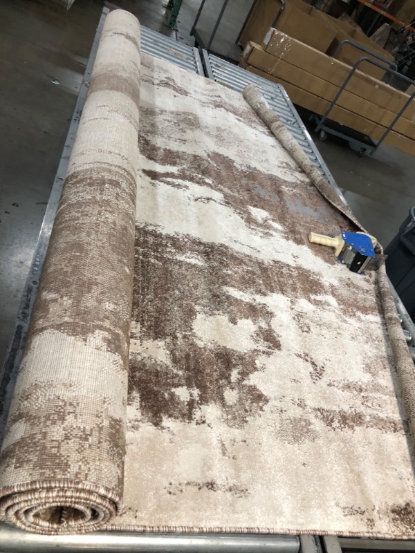 Photo 1 of 7'7"x9' brown tri-color rug (Unknown brand/style) 