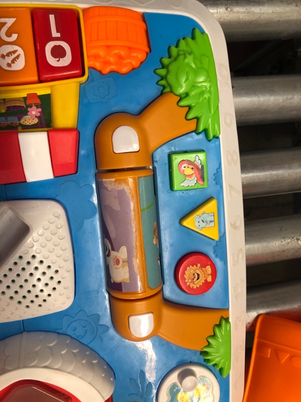 Photo 3 of COSMETIC DAMAGES***Fisher-Price Laugh & Learn Around The Town Learning Table
