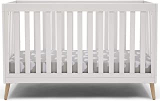 Photo 1 of Delta Children Essex 4-in-1 Convertible Baby Crib, Bianca White with Natural Legs + Simmons Kids Quiet Nights Dual Sided Crib and Toddler Mattress (Bundle)