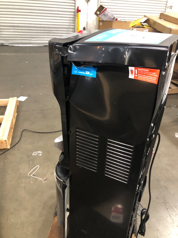 Photo 5 of ***PARTS ONLY*** DAMAGED Brio Bottom Loading Water Cooler Water Dispenser – Essential Series - 3 Temperature Settings - Hot, Cold & Cool Water - UL/Energy Star Approved
**DENTS, CRUSHED, BROKEN ON TOP, BOTTOM DOOR BROKEN, POWERED ON**
