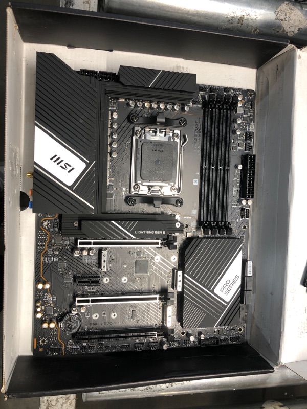 Photo 1 of MSI PRO X670-P WiFi ProSeries Motherboard (AMD AM5, DDR5, PCIe 4.0, SATA 6Gb/s, M.2, USB 3.2 Gen 2, Wi-Fi 6E, HDMI/DP, ATX)