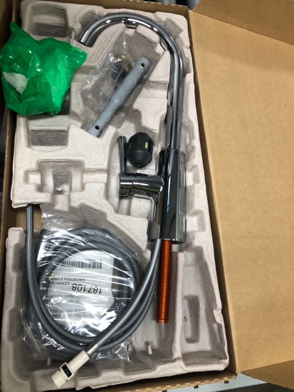 Photo 1 of Moen Riley Chrome One-Handle Pulldown Kitchen Faucet Featuring Power Boost for a Faster Clean and Reflex Docking System for the Spray Head, Modern Kitchen Sink Faucet, 7402C Standard Chrome