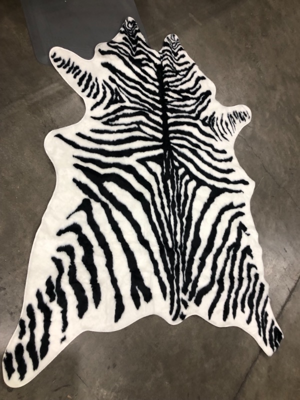 Photo 2 of 80x60 faux zebra rug