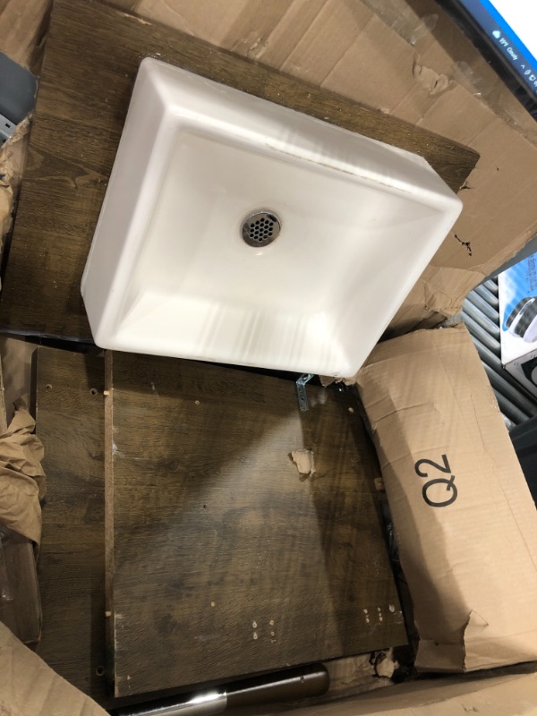 Photo 1 of Bathroom Dark Wooden Brown with White Sink and White Brown Line Drawers, Approx. Size 24" x 18"  *Minor Damages One Drawer*