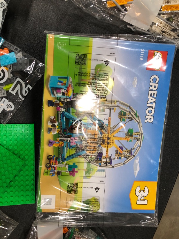 Photo 3 of LEGO Creator 3in1 Ferris Wheel 31119 Building Kit with Rebuildable Toy Bumper Cars, Boat Swing and 5 Minifigures; New 2021 (1,002 Pieces) Standard Packaging