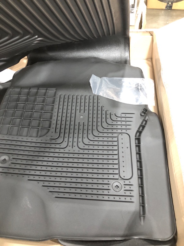 Photo 3 of Husky Liners Weatherbeater Series | Front & 2nd Seat Floor Liners - Black | 94061 | Fits 2017-2022 Ford F-250/F-350, 2017-2018 & 2021-2022 Ford F-450 Super Duty Crew Cab w/ Fold Flat Storage 3 Pcs Weatherbeater Floor Liners