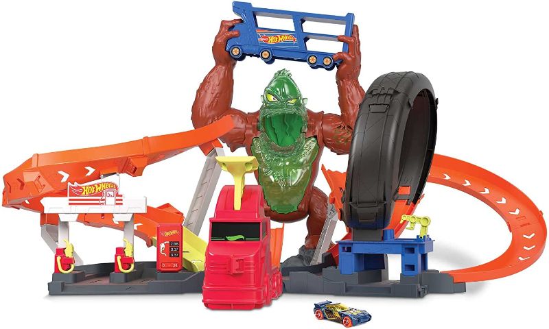 Photo 1 of Hot Wheels Toxic Gorilla Slam Gas Station & Tire Repair Shop Playset with Adjustable Launcher, Lights & Sounds & 1 1:64 Scale Car, Connects to Other Track Sets, Gift for Kids 5 Years Old & Up
