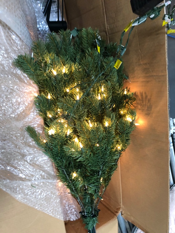 Photo 4 of National Tree 4 .5' "Feel Real" Downswept Douglas Fir Hinged Tree with 450 Clear Lights
