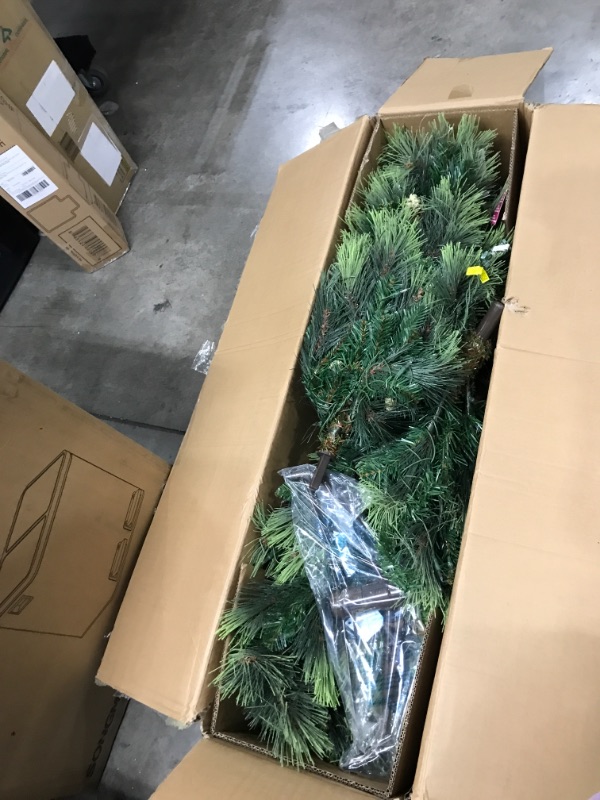 Photo 2 of *** TESTED **** National Tree Company Pre-lit Artificial Christmas Tree | Includes Pre-strung White Lights and Stand | Carolina Pine Slim - 7.5 ft