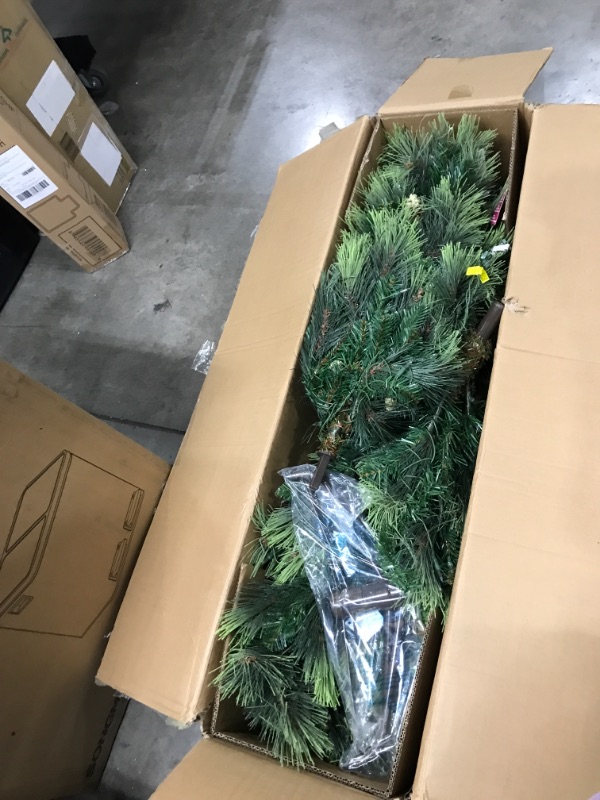 Photo 1 of *** TESTED **** National Tree Company Pre-lit Artificial Christmas Tree | Includes Pre-strung White Lights and Stand | Carolina Pine Slim - 7.5 ft