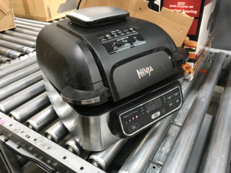 Photo 2 of (Used - Major Damage) Ninja AG301 Foodi 5-in-1 Indoor Grill with Air Fry, Roast, Bake & Dehydrate, Black/Silver Black/Silver 4-Quart Indoor Grill