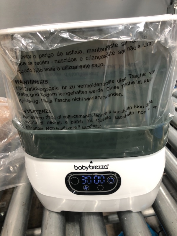 Photo 2 of Baby Brezza Sterilizer & Dryer Advanced, Effective Steam Sterilization, HEPA Filter, Dries 33% Faster, Highest Capacity, Holds 8 Bottles & 2 Pump Part
