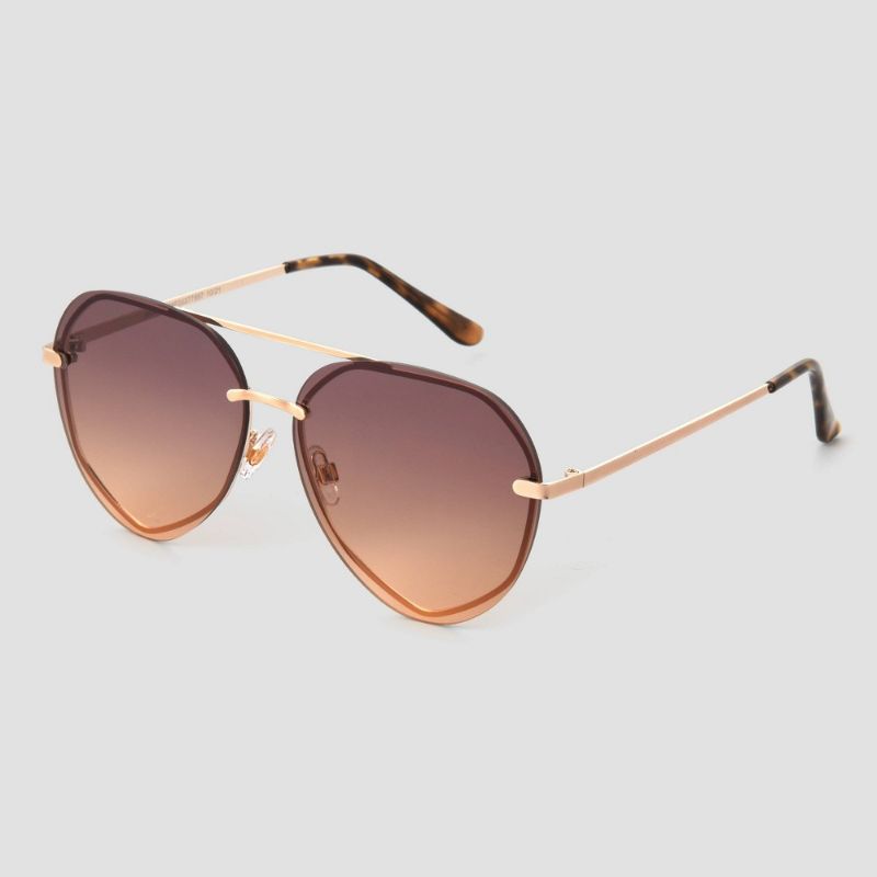 Photo 1 of Women's Tortoise Shell Print Tear Drop Aviator Sunglasses - Universal Thread Brown
