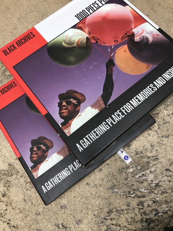 Photo 1 of 2 Pack Bundle Black Archives Man with Balloons Puzzle, 1000 Pieces