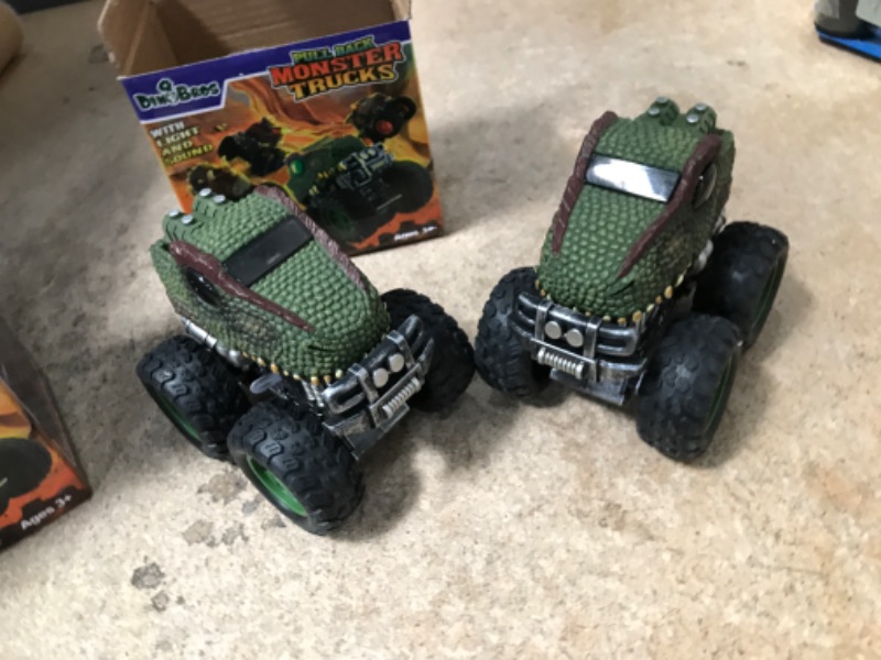 Photo 2 of (2 count)DINOBROS Dinosaur Toys for Boys Age 3 4 5 6 7 Monster Truck Dino Pull Back Car Toy with Light and Sound T-Rex
