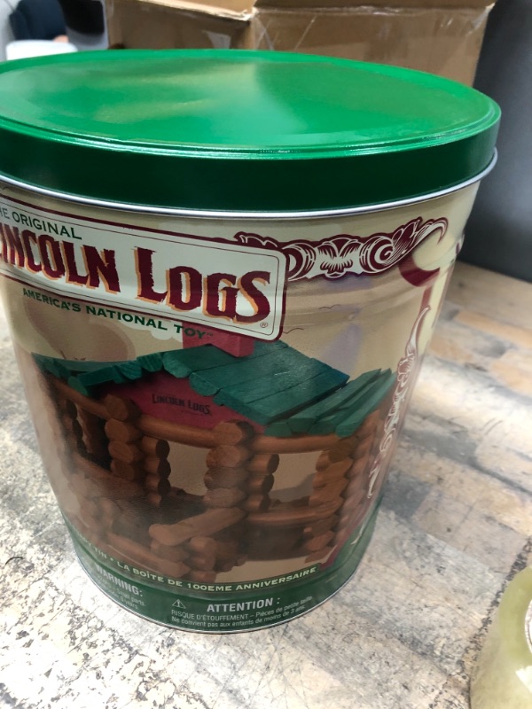 Photo 5 of DAMAGED ITEM
Lincoln Logs –100th Anniversary Tin-111 Pieces-Real Wood Logs-Ages 3+ - Best Retro Building Gift Set for Boys/Girls - Creative Construction Engineering – Top Blocks Game Kit - Preschool Education Toy, Brown (854)