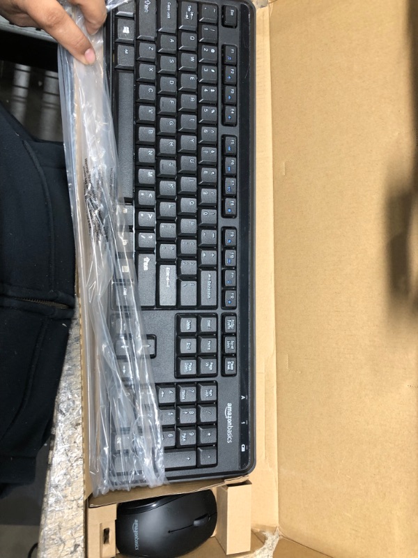 Photo 2 of Amazon Basics Wireless Computer Keyboard and Mouse Combo - Quiet and Compact - US Layout (QWERTY)