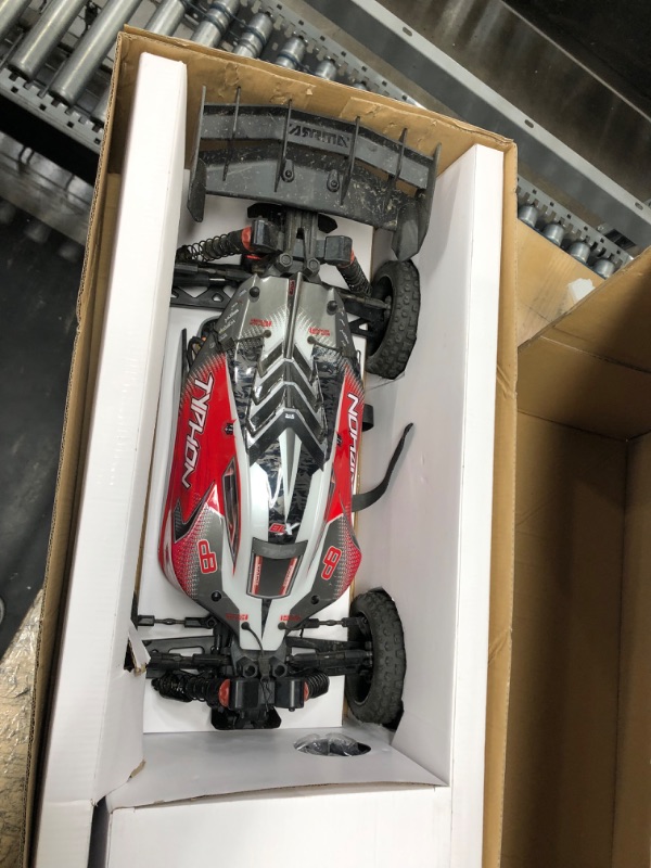 Photo 3 of ARRMA RC Car 1/8 Typhon 6S V5 4WD BLX Buggy with Spektrum Firma RTR (Ready-to-Run), Black and Red, ARA8606V5