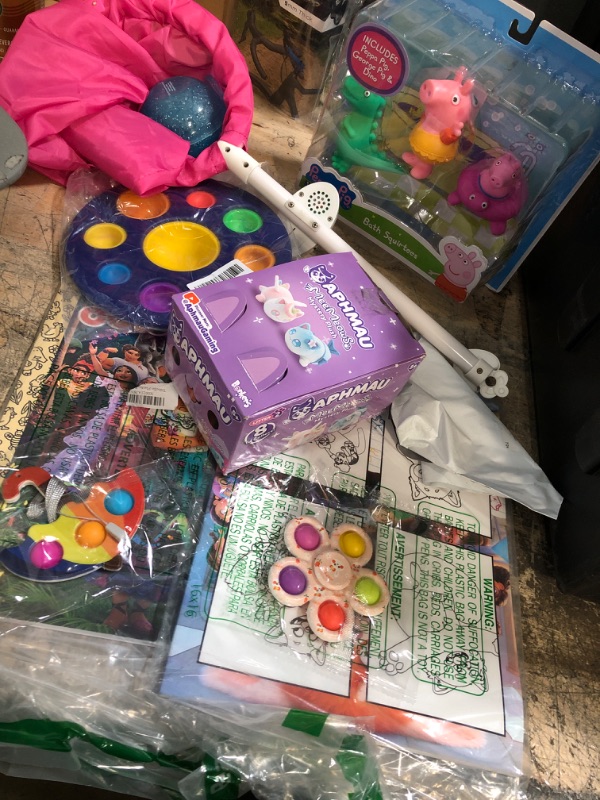 Photo 1 of Bundle of 10- assorted toys, fidgets, coloring books 