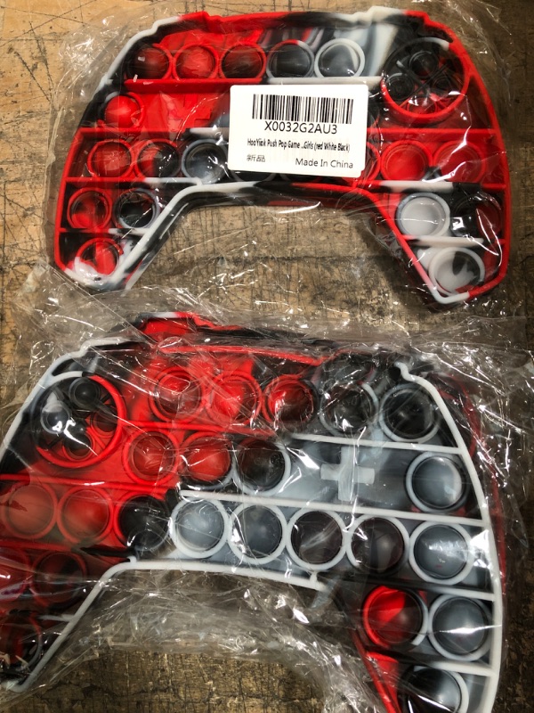 Photo 1 of 2 of- Push Pop Game Controller Pop Fidget Toy, Stress Relief Video Game Pop for Boys, Gamepad Pop Fidget Poppers Suitable for ADHD, Sensory Pop Fidget Toys Gift for Boys and Girls. (Black Red)

