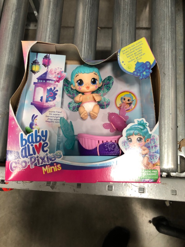 Photo 2 of Baby Alive Glo Pixies Minis Doll, Aqua Flutter, Glow-in-The-Dark Doll for Kids Ages 3 and Up, 3.75-Inch Pixie Toy with Surprise Friend
