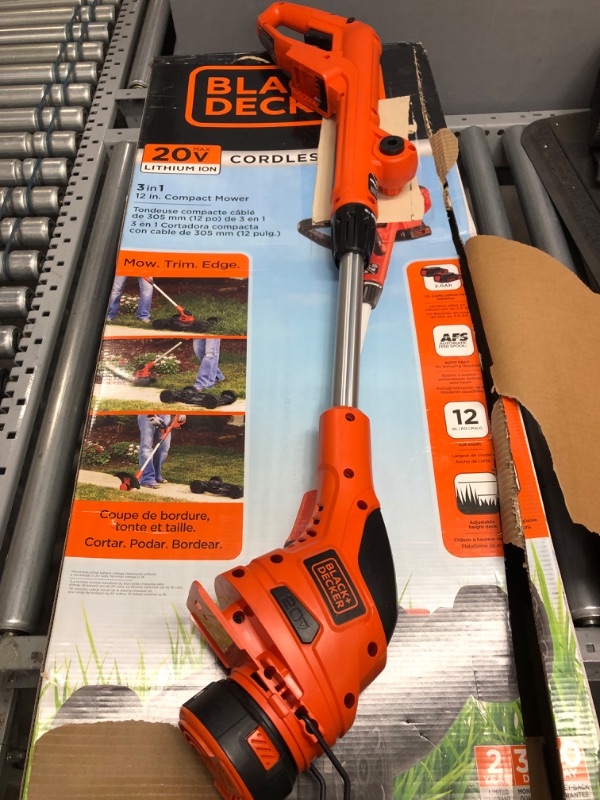 Photo 2 of Black & Decker MTC220 Max Cordless Lithium-Ion 3-in-1 Trimmer/Edger & Mower, Orange/ Black.