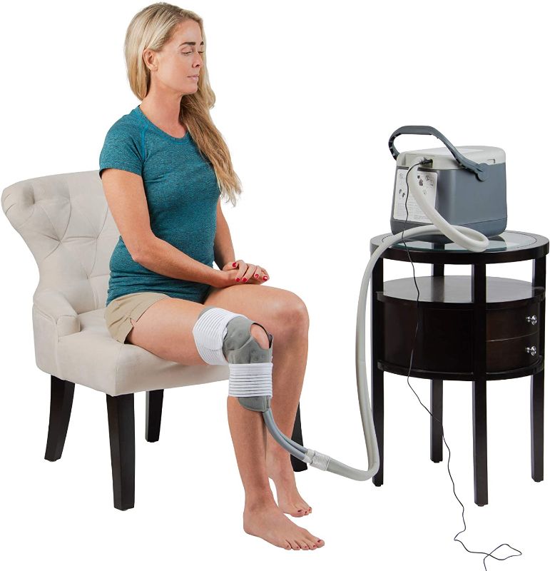 Photo 1 of Ossur Cold Rush Compact Therapy Machine System with Knee Pad- Ergonomic, Adjustable Wrap Pad Included- Quiet, Lightweight and Strong Cryotherapy Freeze Kit Pump