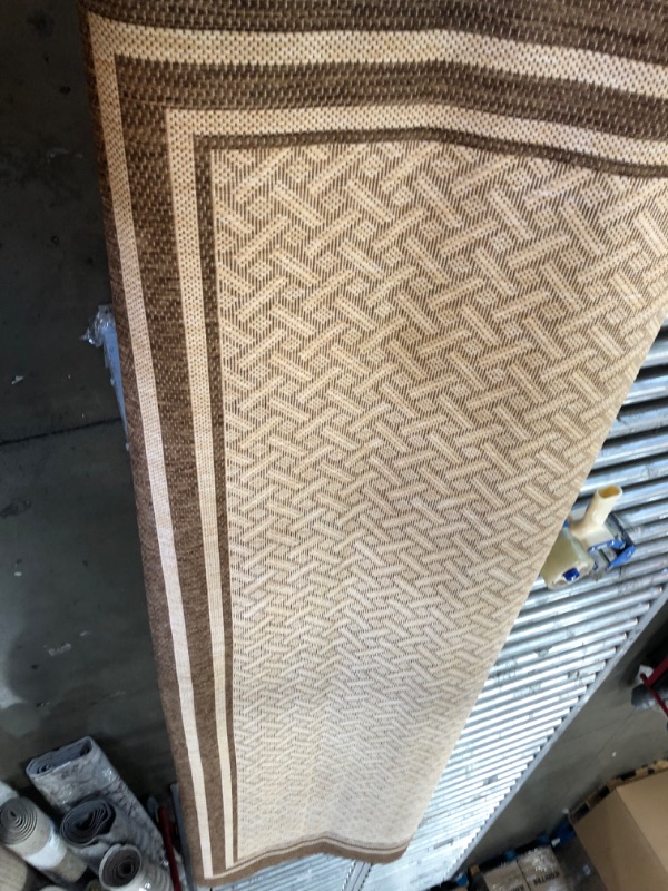 Photo 1 of 7'10"x9' brown rug (Unknown brand/style) 