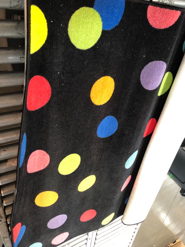 Photo 1 of 4'11x5' black - dots rug 