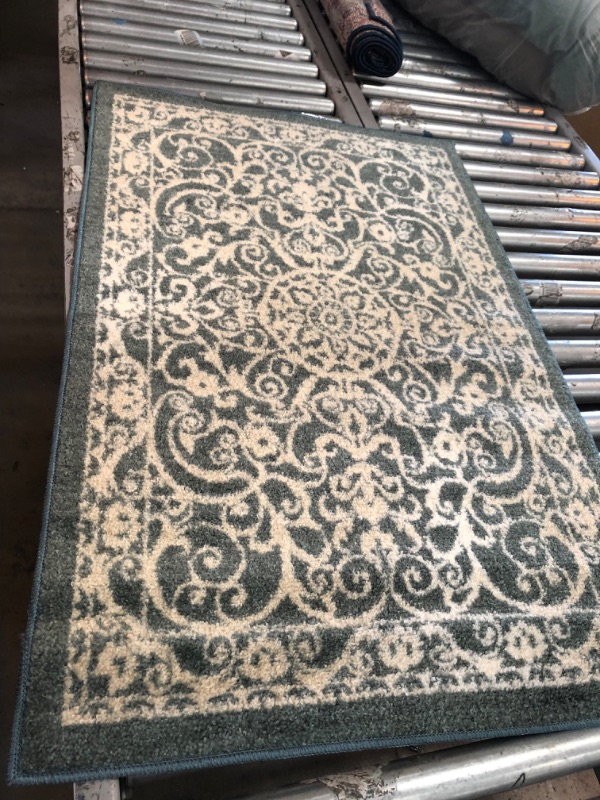 Photo 1 of 2'6"x3'10" green/white rug 