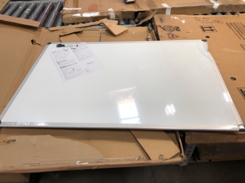 Photo 2 of DENTED/BENT**Amazon Basics Magnetic Dry Erase White Board, 36 x 24-Inch Whiteboard - Silver Aluminum Frame