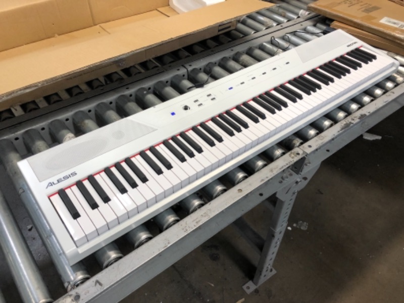 Photo 2 of Alesis Recital – 88 Key Digital Piano Keyboard with Semi Weighted Keys, 2x20W Speakers, 5 Voices, Split, Layer and Lesson Mode, FX 