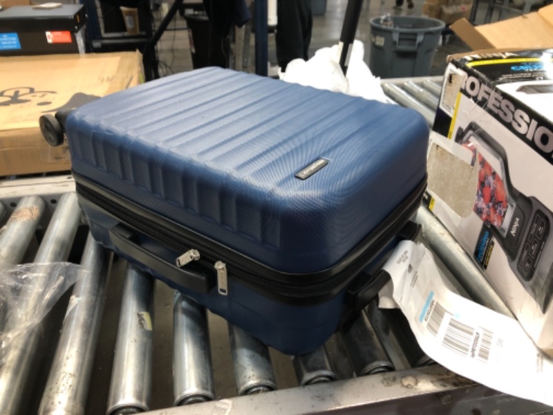 Photo 1 of Amazon Basics 21-Inch Hardside Spinner, Navy Blue Navy Blue 21-inch Spinner