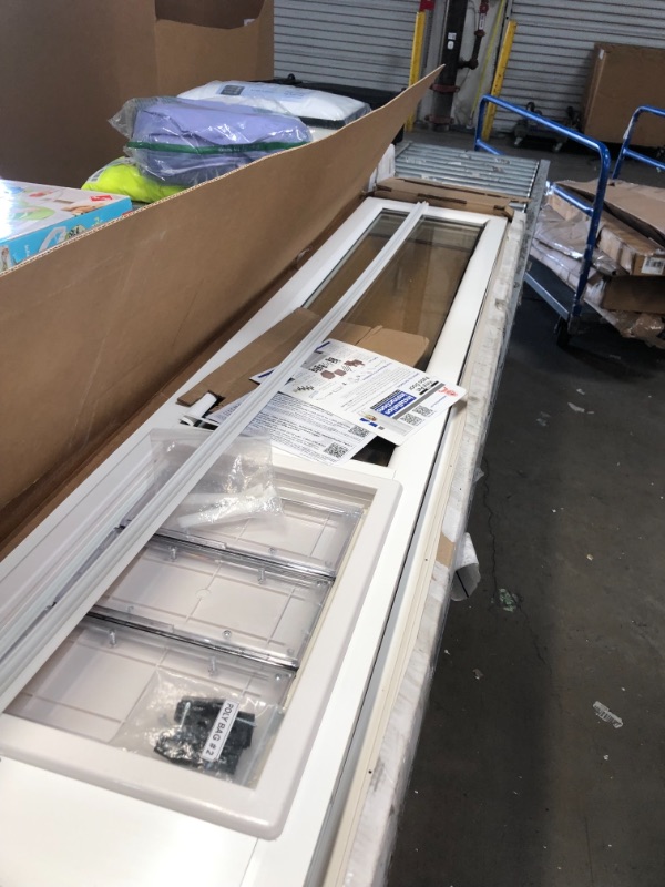 Photo 5 of **box has been opened**
Ideal Pet Products 78" VIP Vinyl Insulated Pet Patio Door, Extra Large, 10.25" x 15.75" Flap Size 78" Door Extra Large - 10.25" x 15.75" Flap Size