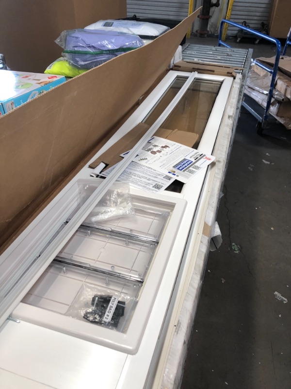 Photo 4 of **box has been opened**
Ideal Pet Products 78" VIP Vinyl Insulated Pet Patio Door, Extra Large, 10.25" x 15.75" Flap Size 78" Door Extra Large - 10.25" x 15.75" Flap Size