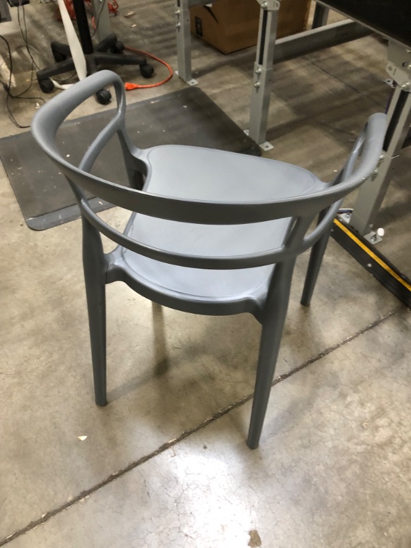 Photo 3 of Amazon Basics Dark Grey, Curved Back Dining Chair-Set of 2, Premium Plastic (MISSING A CHAIR. ONE CHAIR ONLY. CRACKED IN SPOT)