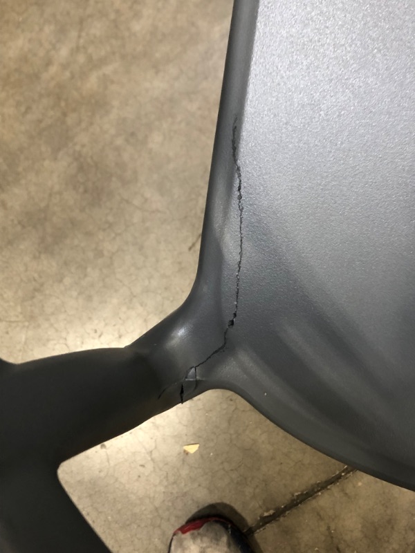 Photo 4 of Amazon Basics Dark Grey, Curved Back Dining Chair-Set of 2, Premium Plastic (MISSING A CHAIR. ONE CHAIR ONLY. CRACKED IN SPOT)