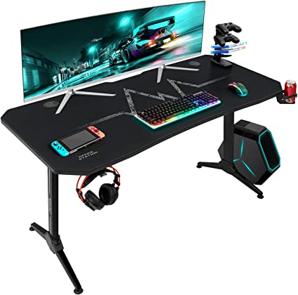 Photo 1 of Furmax 55 Inch Gaming Desk T-Shaped PC Computer Table with Carbon Fiber Surface Free Mouse Pad Home Office Desk Gamer Table Pro with Game Handle Rack Headphone Hook and Cup Holder (Black)
