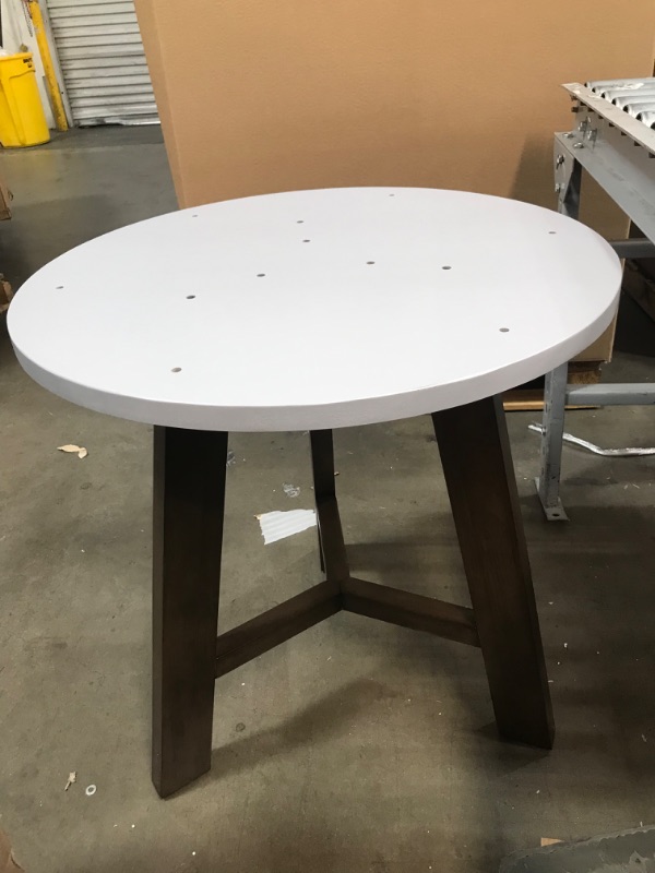 Photo 1 of 27" round table, 29" tall 