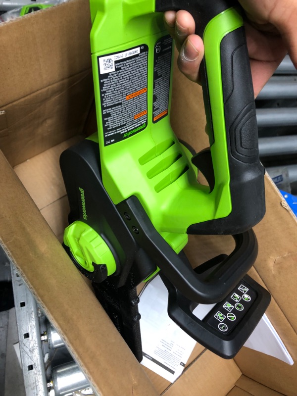 Photo 1 of Greenworks 24V 10" Chainsaw, 2.0Ah USB Battery and Charger

