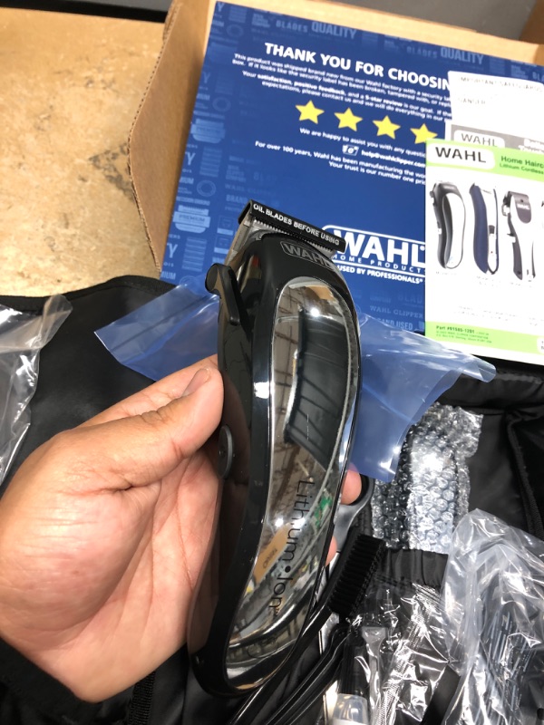 Photo 1 of Wahl Clipper Lithium Ion Cordless Haircutting & Trimming Combo Kit – Rechargeable Electric Clipper for Grooming Heads, Beards, & All Body Grooming – Model 79600-2101P