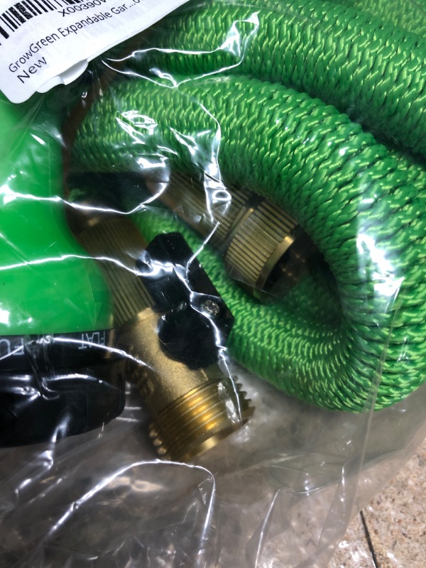 Photo 1 of GrowGreen Expandable Garden Hose with High Pressure Hose Spray Nozzle, All Brass Connectors, Leak Proof, Heavy Duty Material 25 Feet