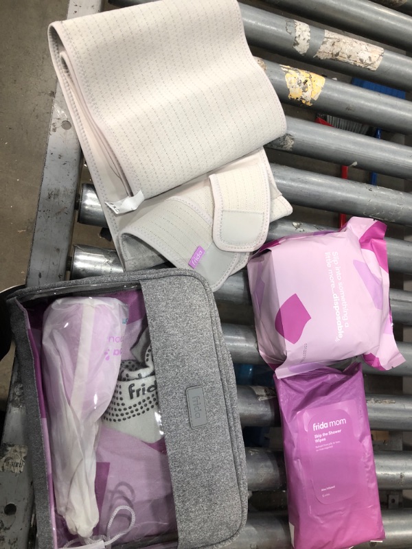 Photo 3 of **MISSING PARTS** Frida Mom Hospital Packing Kit for Labor, Delivery, & Postpartum | Nursing Gown, Socks, Peri Bottle, Disposable Underwear, Ice Maxi Pads, Pad Liners, Perineal Foam, Toiletry Bag, 15 Piece Set
