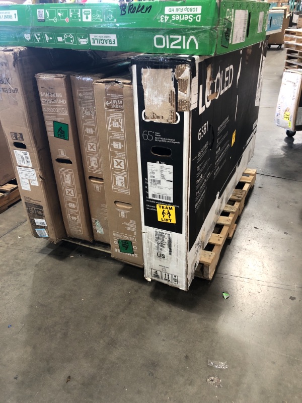 Photo 1 of MIXED PALLET OF DAMAGED TVS**7 UNITS**NO REFUNDS**