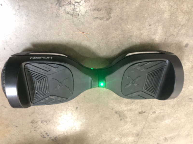Photo 1 of Hover-1 Drive Electric Hoverboard | 7MPH Top Speed, 3 Mile Range, Long Lasting Lithium-Ion Battery, 6HR Full-Charge, Path Illuminating LED Lights

