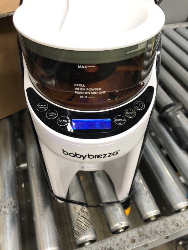 Photo 1 of New and Improved Baby Brezza Formula Pro Advanced Formula Dispenser Machine - Automatically Mix a Warm Formula Bottle Instantly - Easily Make Bottle with Automatic Powder Blending
