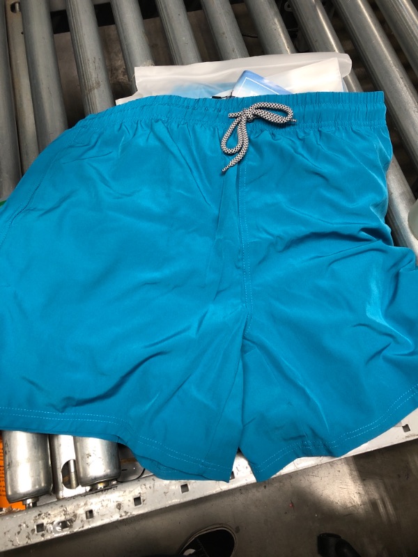 Photo 2 of Amazon Essentials Men's 7" Quick-Dry Swim Trunk
size large