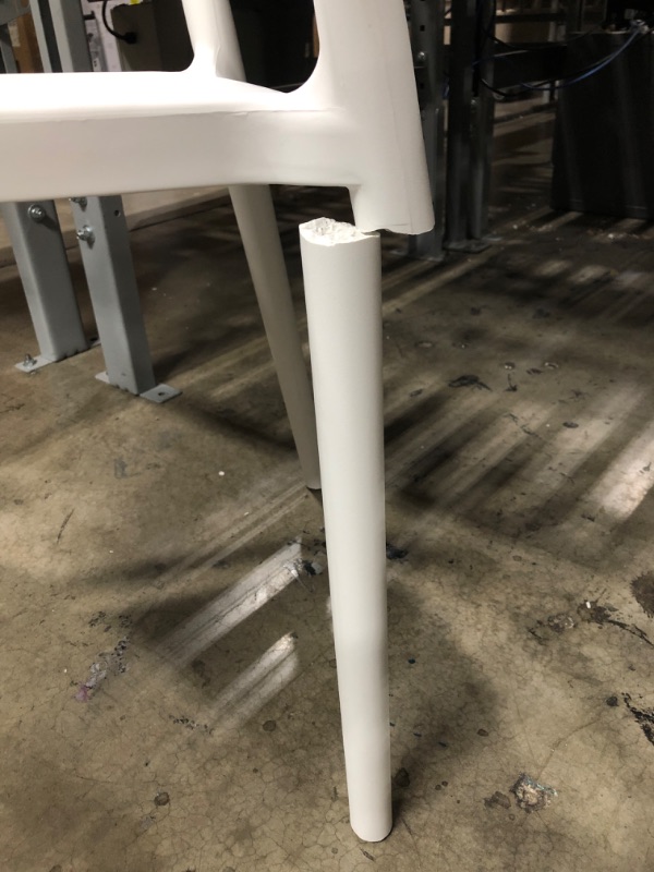 Photo 1 of Amazon Basics White, Curved Back Dining Chair Premium Plastic *One Leg Damaged Can be Super Glued* 
